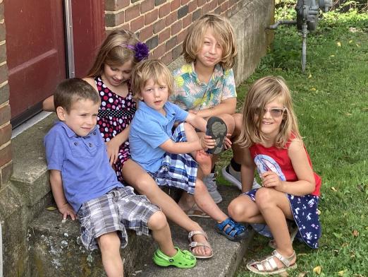 Children sitting on steps